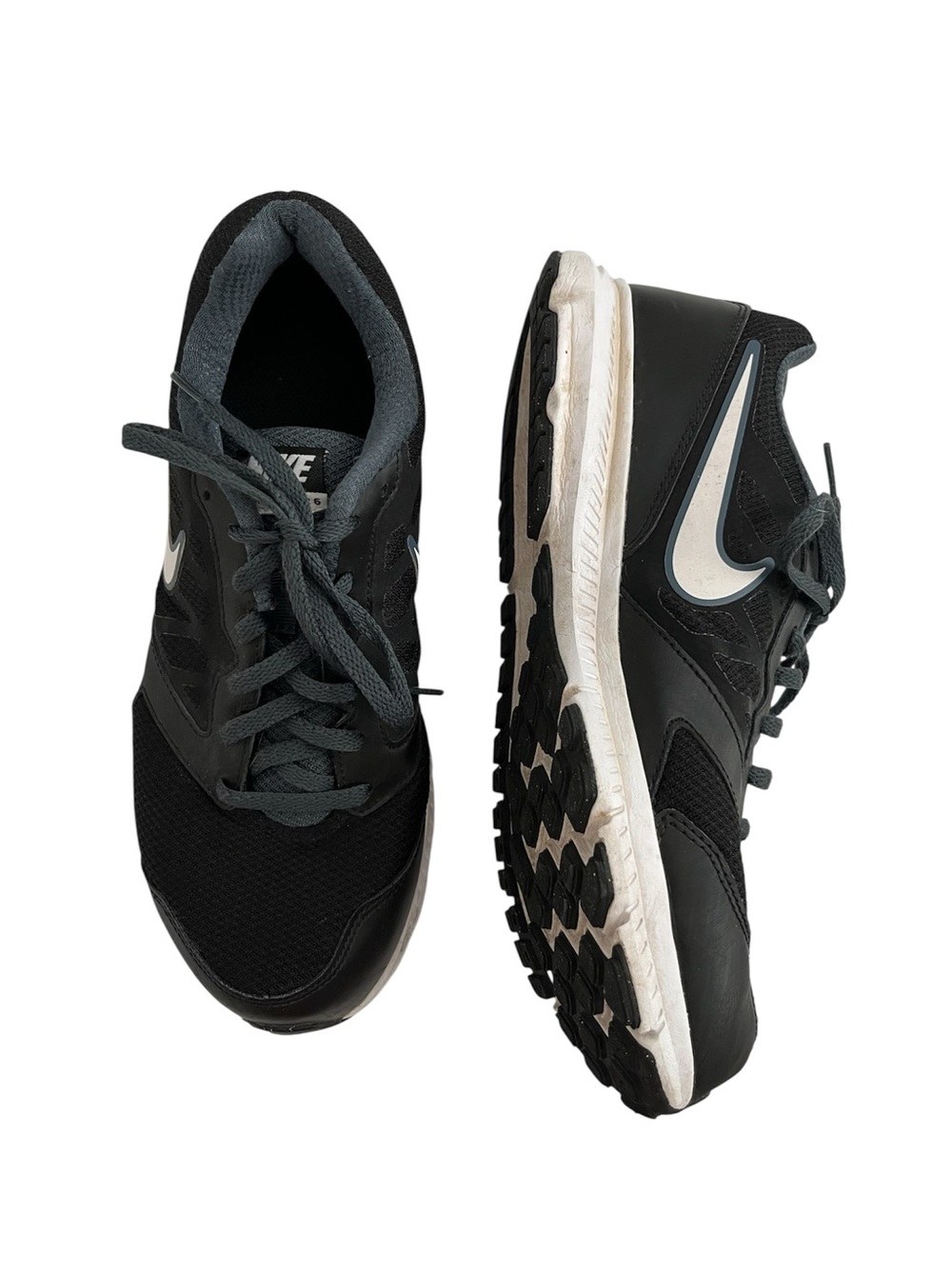 Nike Men’s Black Running Shoes with White Swoosh